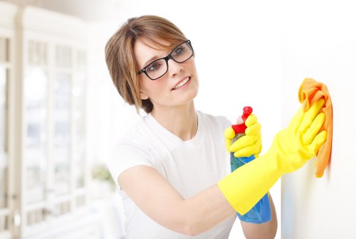 Professional office cleaners preparing a workspace for end of tenancy cleaning