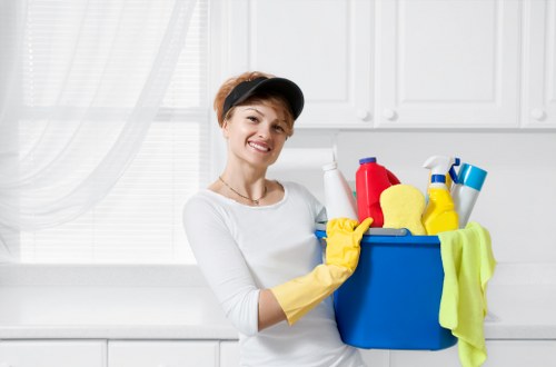 Professional office cleaning team preparing a workspace for move-out